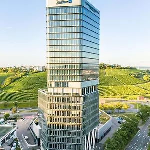 **** Отель Radisson Blu At Porsche Design Tower Германия
